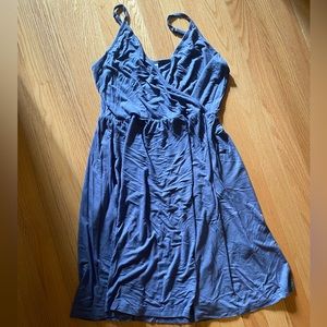 Purple tee shirt material dress. Wrap style top. Pockets. Size large